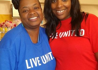 Directory of Health and Family Services Jacqualine Boles and Voulnteer from the United Way Day of Careing